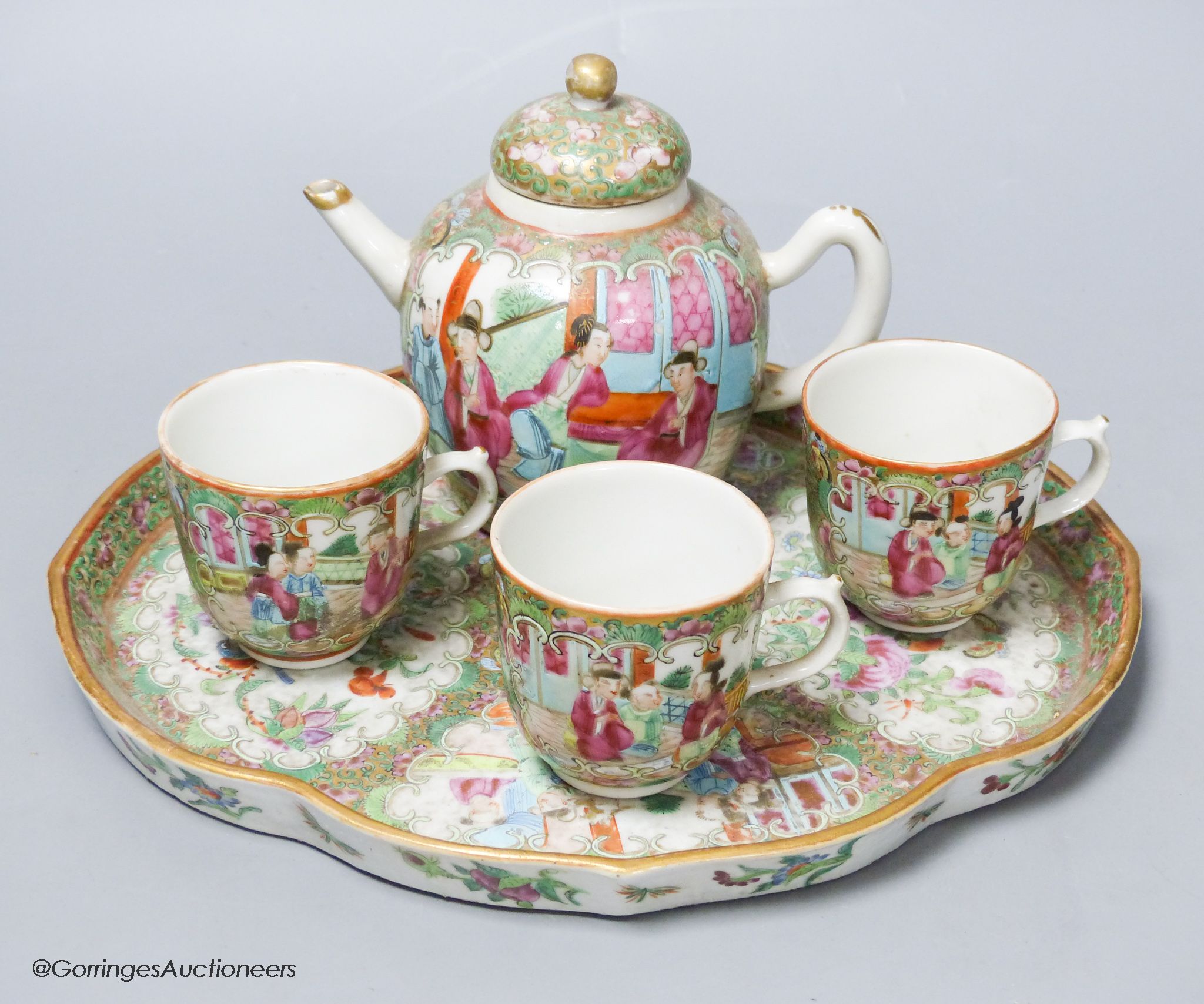 A 19th century Chinese famille rose five piece porcelain tea set